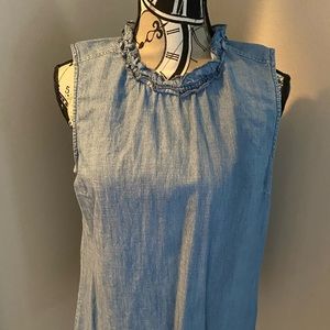 Like new sleeveless jean shirt.